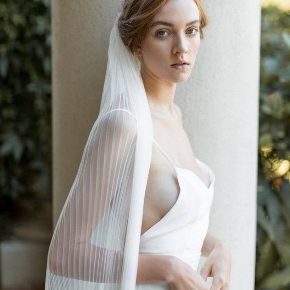 Pleated veil. Never been used.